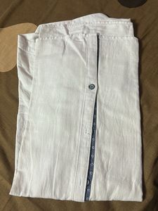 White shirt, with blue prints.