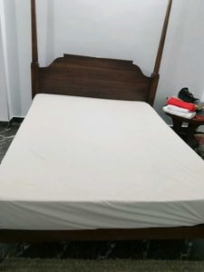 Elegant Four-Poster Bed Frame