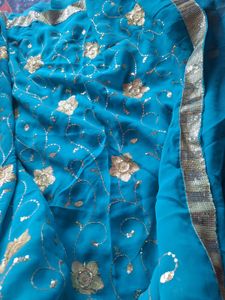 Stunning Blue Saree with Gold Embroidery