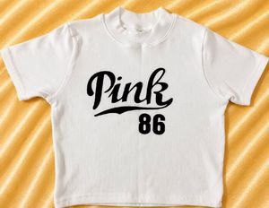 white graphic crop top