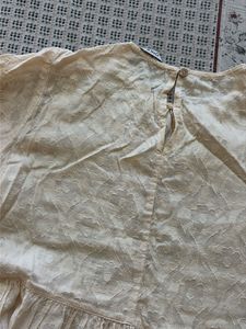 Cream Textured Peplum Top