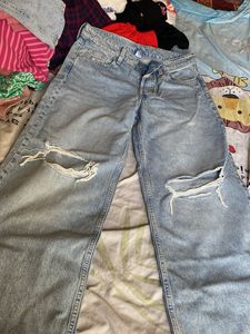 Distressed Light Wash mid rise Wide Leg Jeans