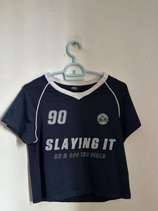 Navy "Slaying It" Graphic jersey style crop top