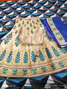 Beige Lehenga Choli with Blue Floral Embroidery