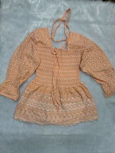 Peach Embroidered Smocked top