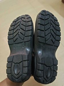 Black Shoe with Orange Stitching