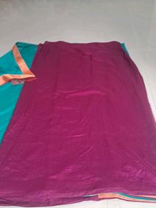 Elegant Teal Saree with Golden Border