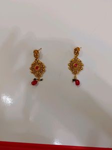 Gold Earrings With Mangtika In Red Stone