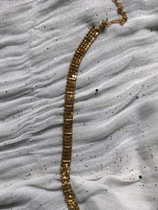 Elegant Gold Chain with Green Stones