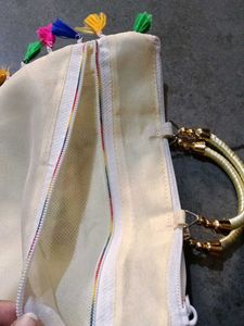 Embroidered Clutch with Tassels