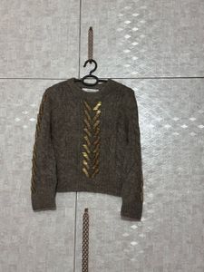 Zara sweater with gold-tone embellishments.