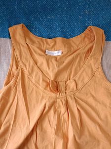 Cute Orange Sleeveless Top with Bow