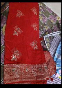 Red chiffon zari saree with stitched blouse