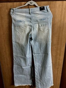 Unique Heart Cutout Flare Jeans