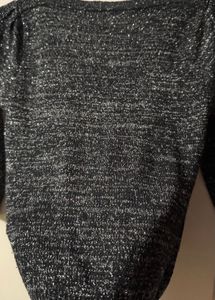 Black stylish top with shimmery interlacing