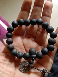 Black Bead Bracelet with Coin Charm