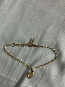Gold bracelet  with Clover charm