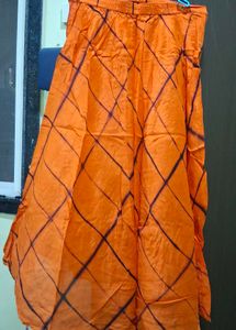 Vibrant Orange Ethnic Skirt with Tie-Dye Pattern