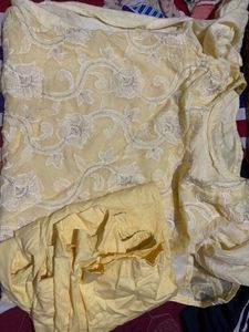 Elegant Yellow Kurta Set with Intricate Embroidery