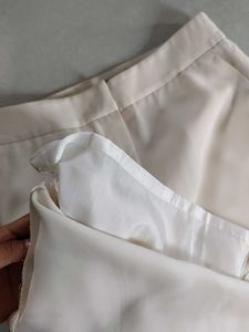 Light beige trousers