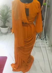 Elegant Orange Saree with Embellishments