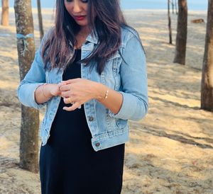 Classic Denim Jacket with Black Maxi Dress