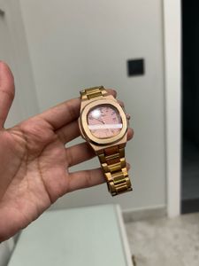 Elegant Rose Gold Watch with Pink Dial