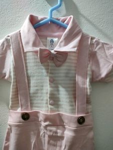 BKIDS small size boy's dress look like romper in pink and white color combination.