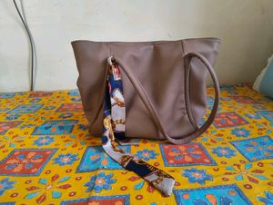 Stylish Beige Tote Bag with Scarf Accent