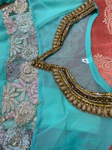 Elegant Teal Kurta Set with Intricate Embroidery