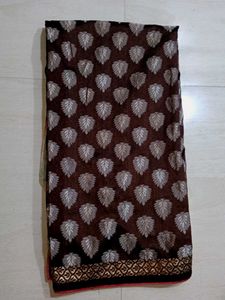 Elegant Brown Saree with Leaf Motifs