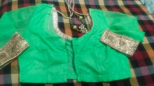 Vibrant Green Blouse with Golden Embellishments
