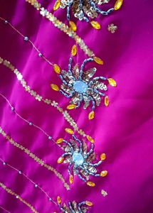 Elegant Pink Saree with Gold Embellishments