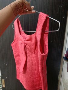 Top With Cute Tie Design At The Back And Front And With The Pink Colour At Size S