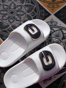 White Slides with 'G' Logo