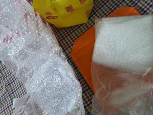 Multiple shopping bags and packing material