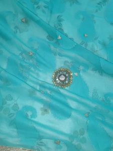 Elegant Teal Saree with Gold Border