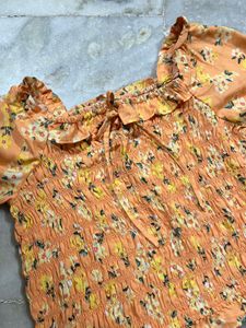 Orange Floral Smocked Puff Sleeve Top