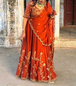 Elegant Orange Embroidered Lehenga Choli