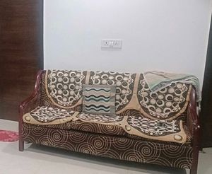 Brown 5 seater Sofa cover Circular Pattern
