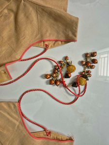 beige cotton blouse