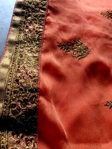 Elegant Orange Embroidered Saree