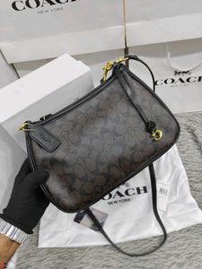 COACH**CARY MEDIUM CROSSBODY BAG IN SIGNATURE COAT