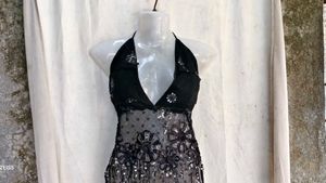 69. Stunning Black Sequin Halter Top