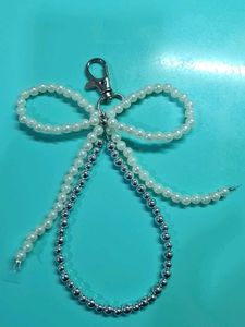 pearl bow keychain with silver beads