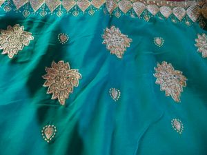 Elegant Teal Embroidered Saree