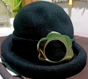 Chic black Cloche Hat with Gold Flower Accent