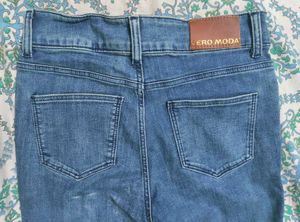 Ripped bellbottom jeans