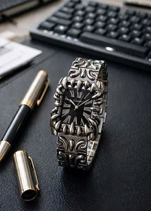 Silver Tone Watch with Intricate Design