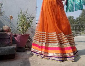 Vibrant Orange Tulle Skirt with Embellished Border